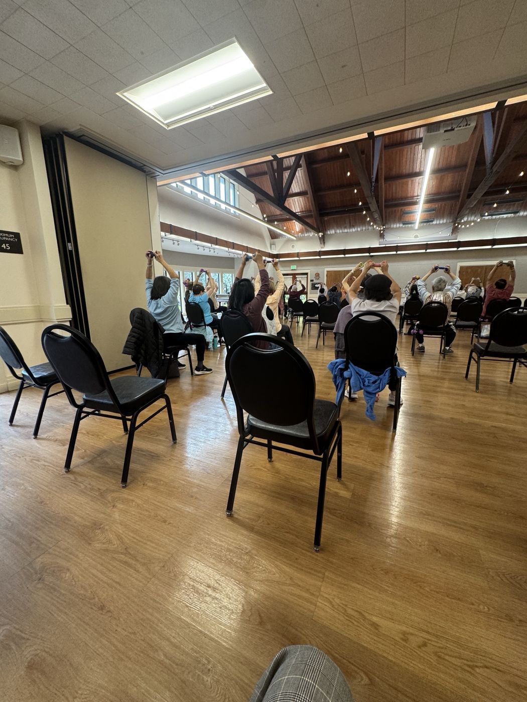 An exercise class with hand weights at the San Carlos Adult Community Center